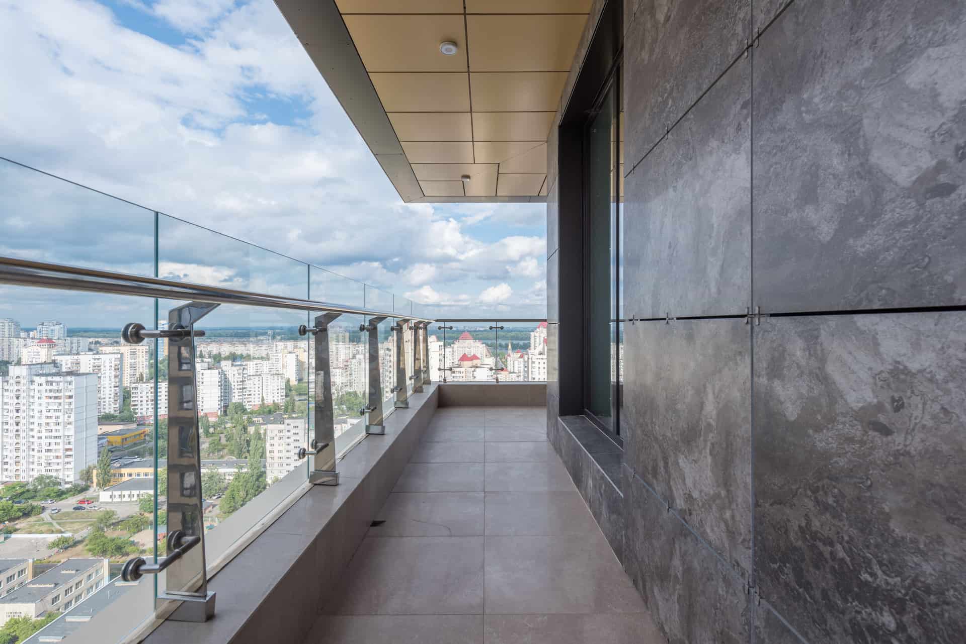 A glazed balcony screen enclosing a terrace